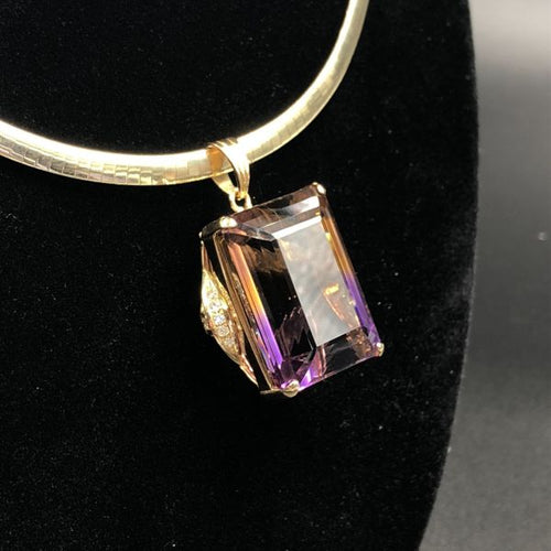 62ct Bolivian Ametrine Pendant in 18kt Gold Custom Mounting with .25ct of Diamonds.
