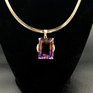62ct Bolivian Ametrine Pendant in 18kt Gold Custom Mounting with .25ct of Diamonds.